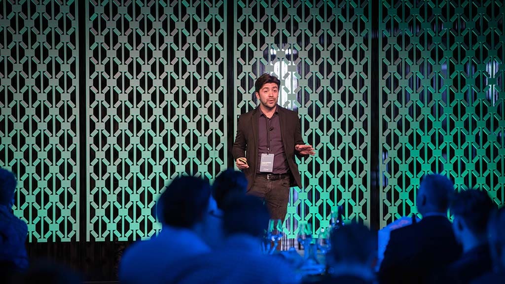 alejandro davila speaking at event